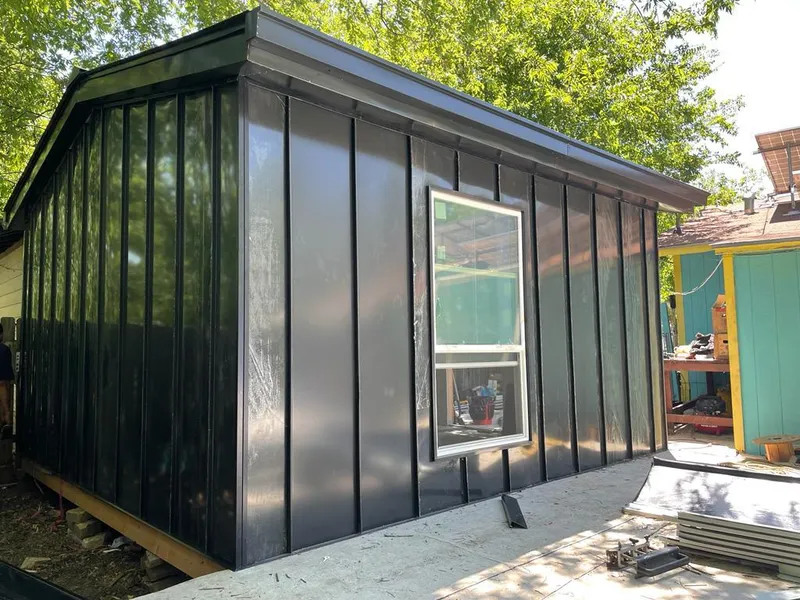 Black standing seam metal wall panels for Metal Roof Installation in Pike Creek