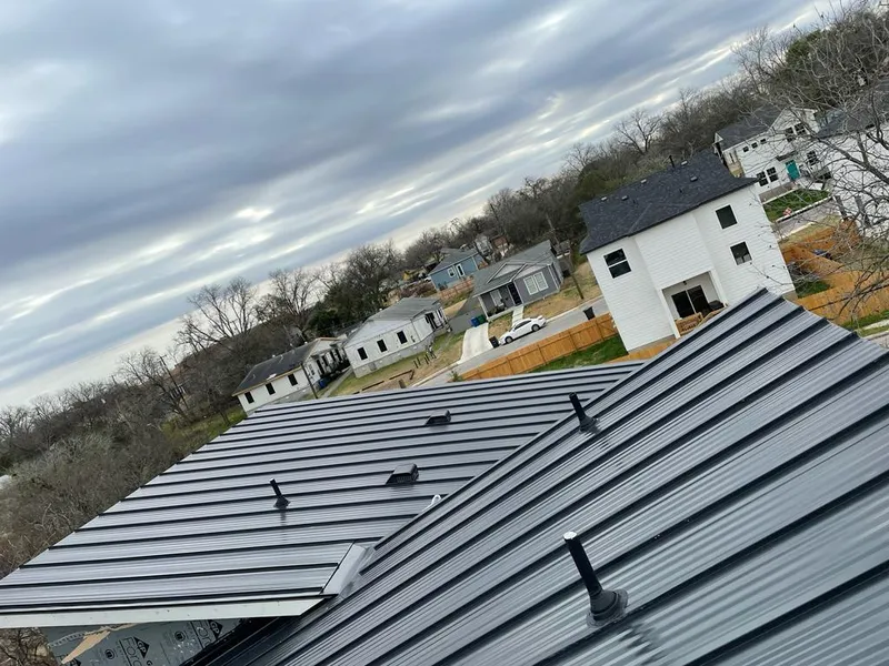 Standing seam metal roof panels with vents for Skylight Repair in Pike Creek